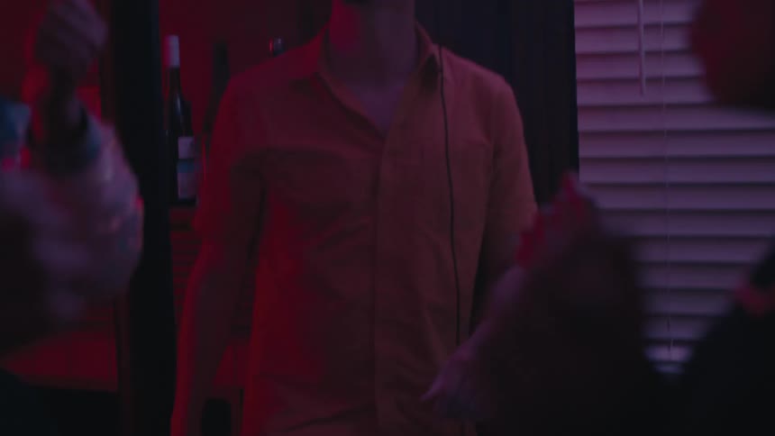 A man is playing music for a party