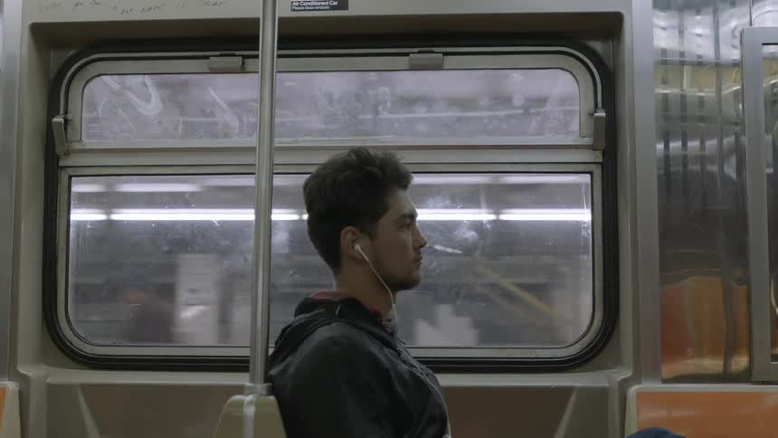 Man riding a subway