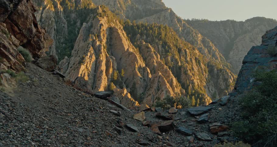 The sun is rising on the mountain range