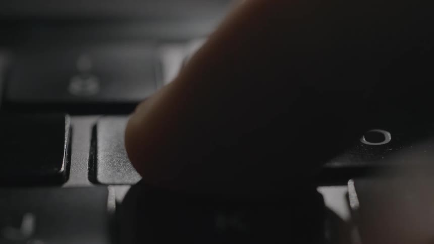 A key hitting a keyboard