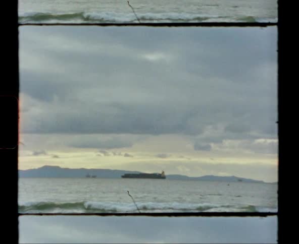 A large ship is in rough water