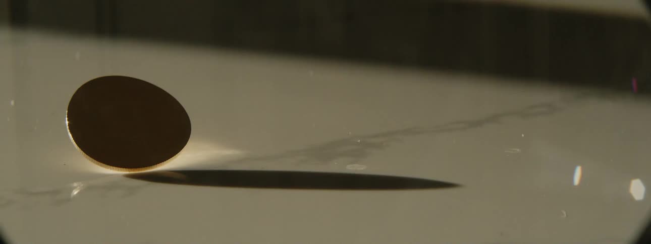 A view of a coin spinning