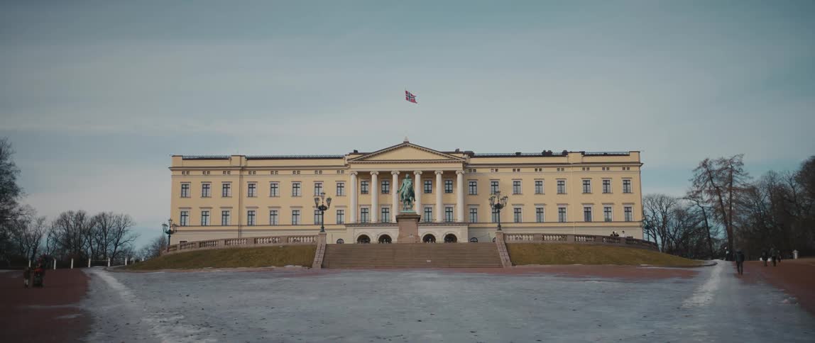 View of the Royal Palace in central Oslo, Norway, with the equestrian statue of Karl Johan visible in the foreground.