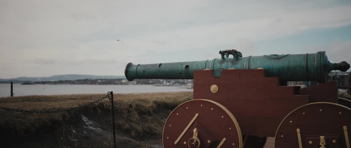 A cannon of Akershus Fortress looking out toward the Oslo Fjord in Oslo, Norway