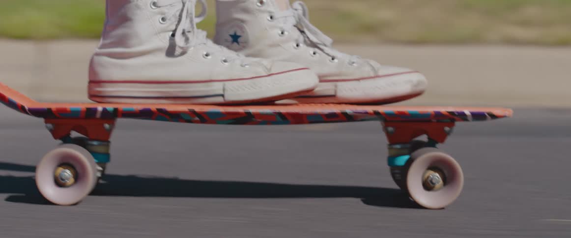 A kid skateboarding outdoors