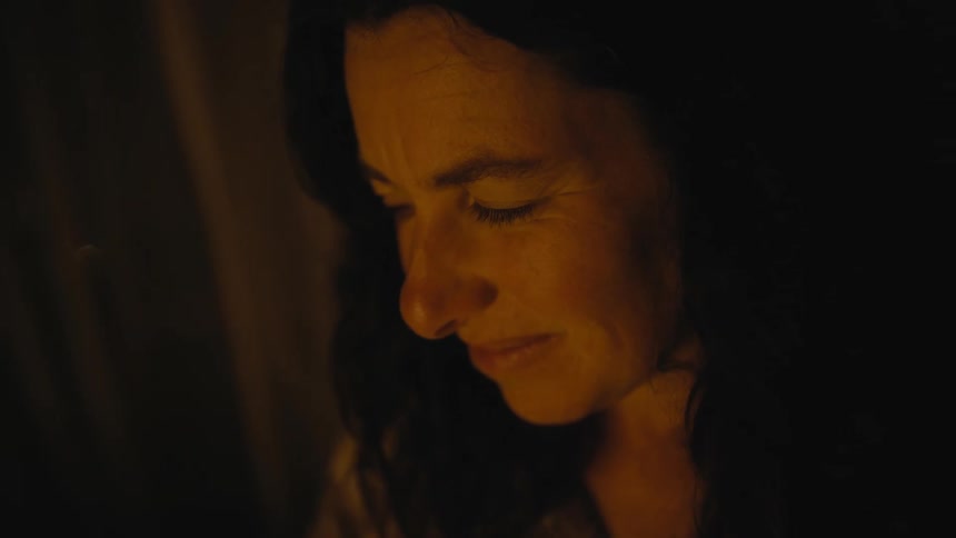 A portrait of a womans face at night