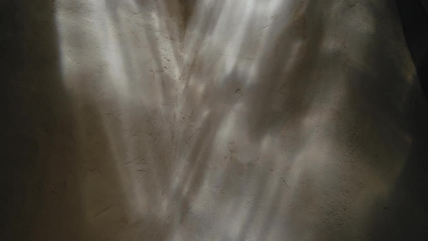 A curtain is covering the window indoors