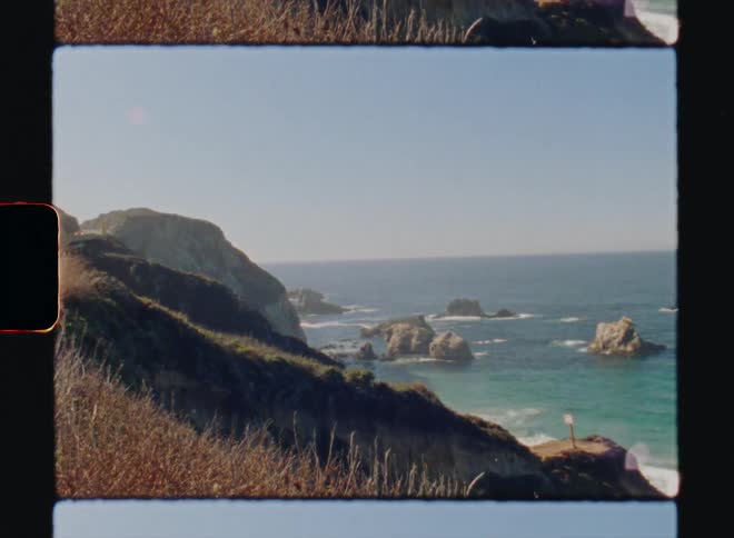 A rocky coastline on a sunny day Big Sur California Super8 4k Film Scan