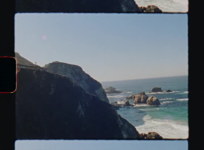Vintage film of a bridge on a cliff on the shore Big Sur California Super8 4k Film Scan