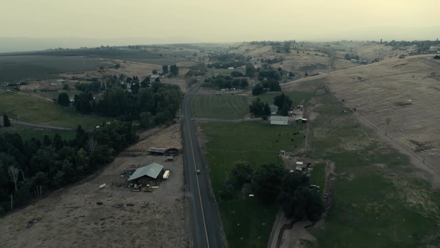 A car drives down the highway