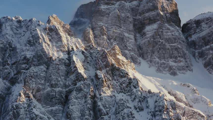 The mountain is covered with snow