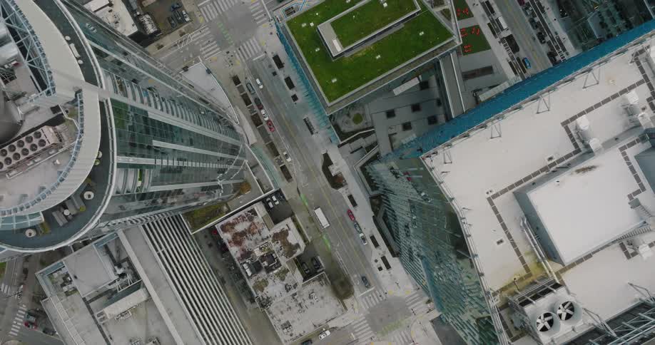 Straight down view of the urban canyon between office and condo towers
