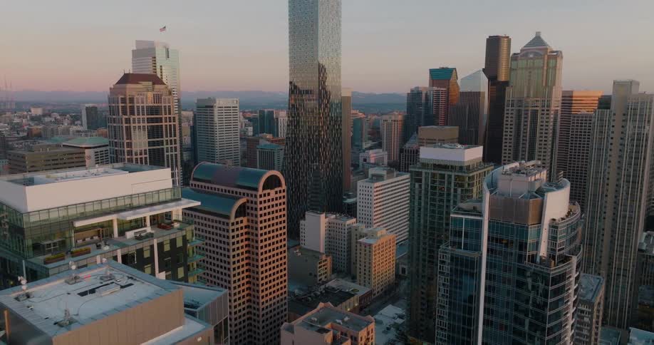 Traverse over tall buildings in the downtown core of a large city