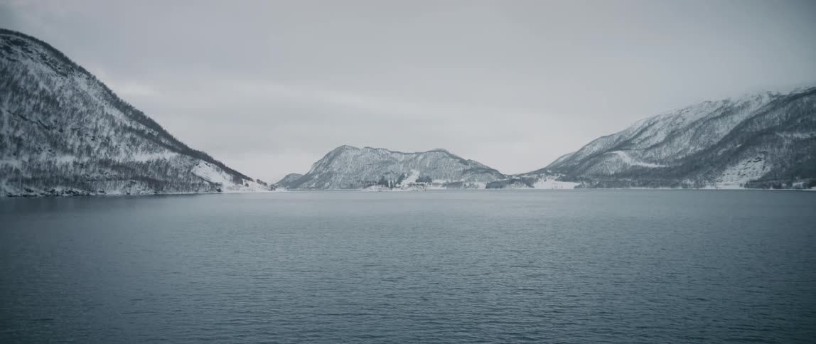 A view of mountains around a lake