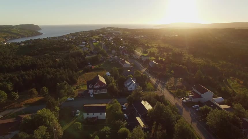 Aerial view of a rural town at sunset