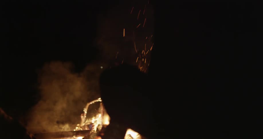 People at a bonfire