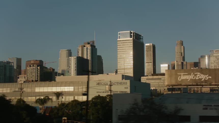 Concrete skyscrapers fill a city skyline