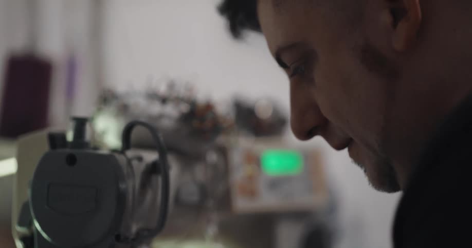Man using an industrial sewing machine