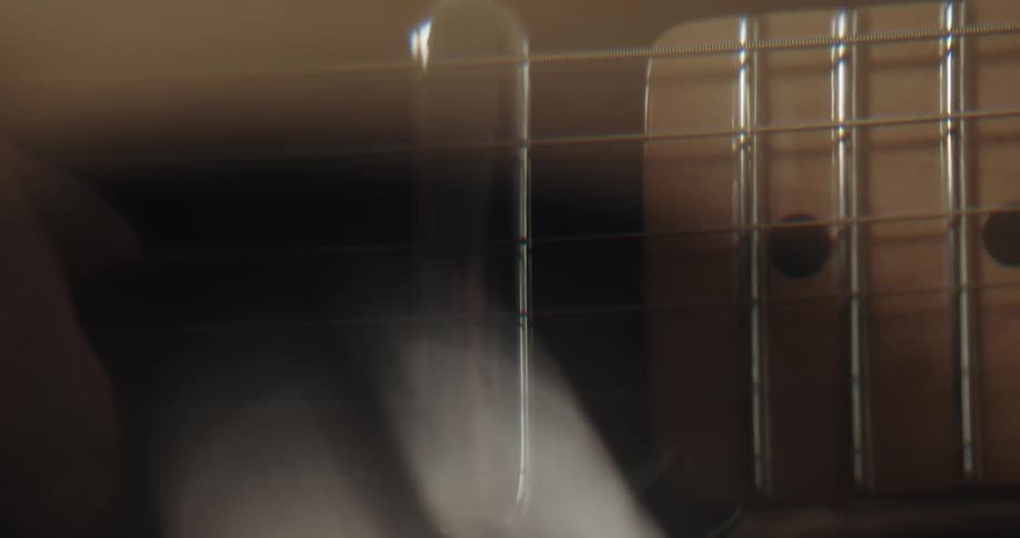 A person is playing an instrument indoors