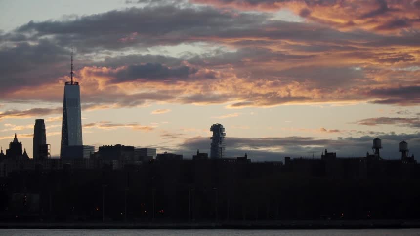 A city skyline at sunset