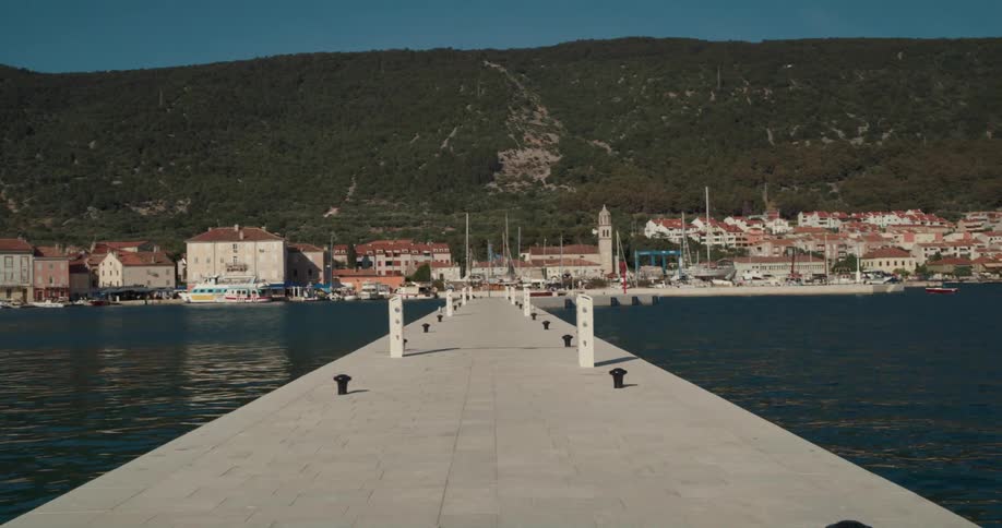 A view of a small city from a pier