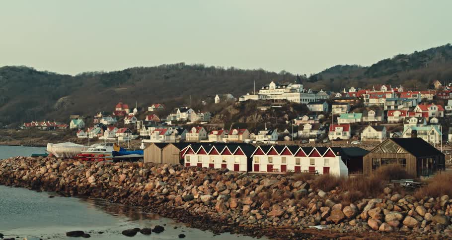 View of coastal town with houses and harbour