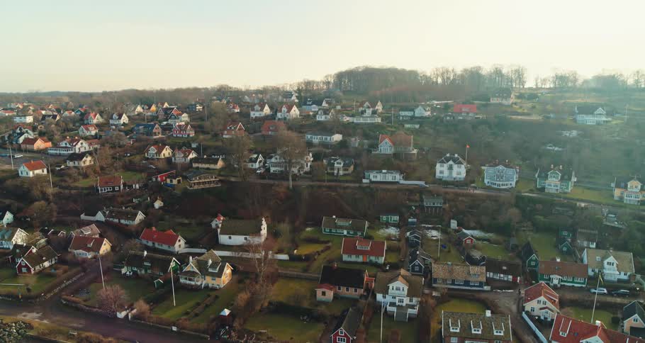Aerial view of houses on the hills of a neighborhood on a small town at morning