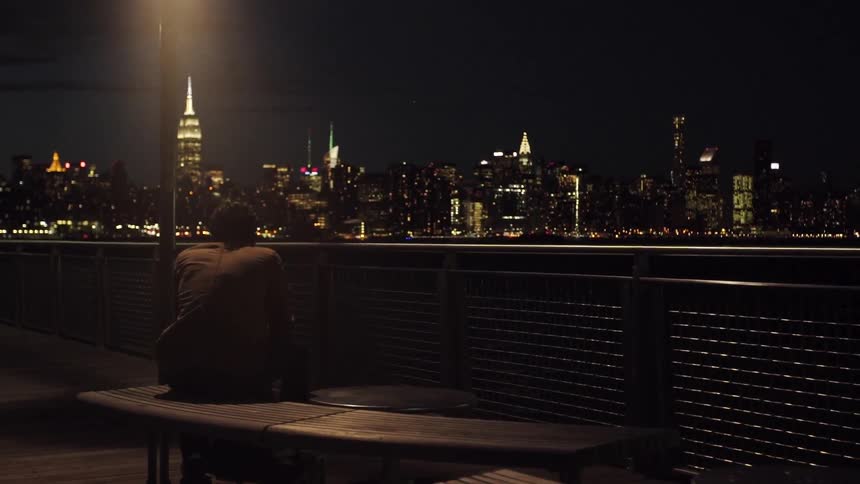A man sitting on a bench