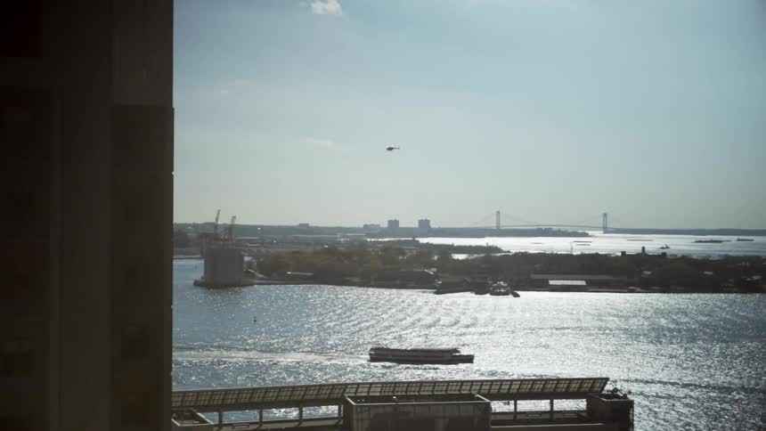 A helicopter is flying in the distance