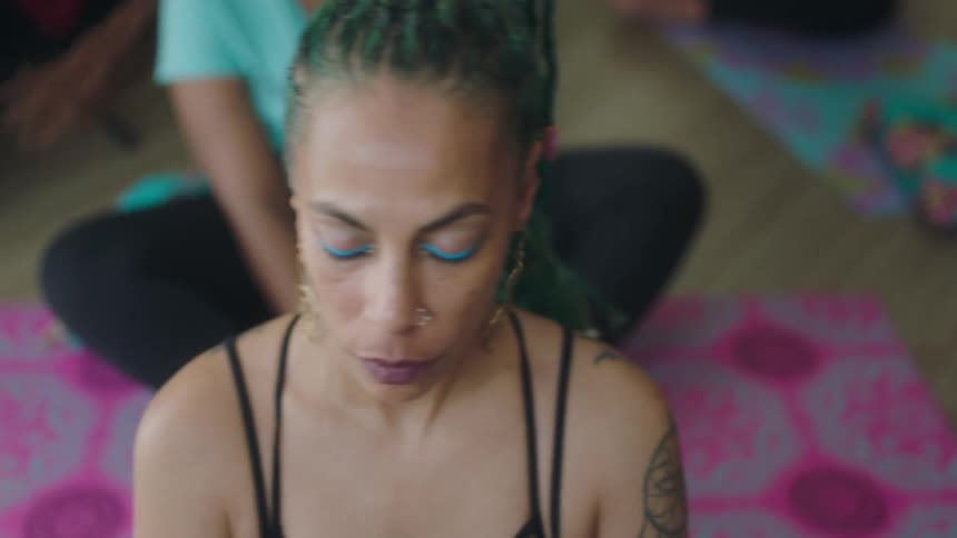 People are doing yoga together
