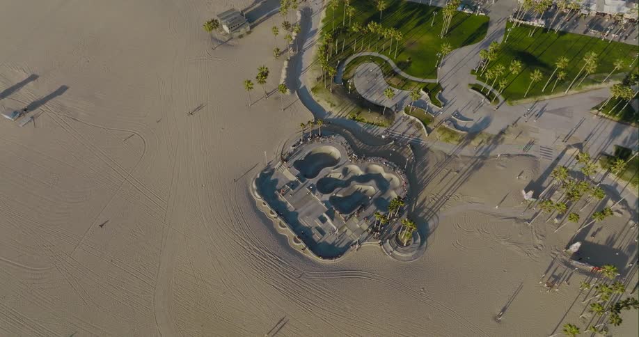 An aerial view of people on a beach at a hotel