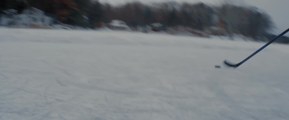 People are playing ice hokey outside