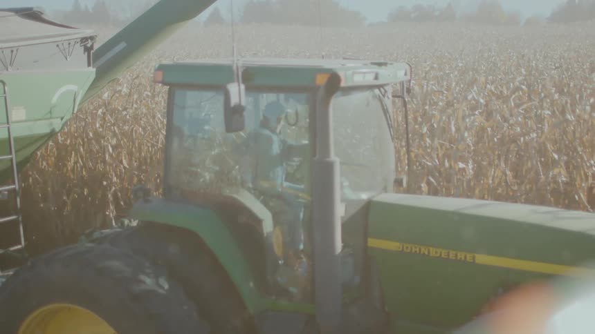 A tractor is working the field