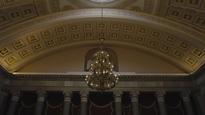 A chandelier is hanging in the US Capitol