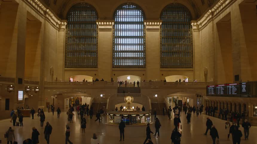 People walking around grand central terminal in new york city