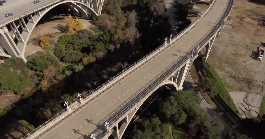 Aerial view of a bridge with cars traveling over