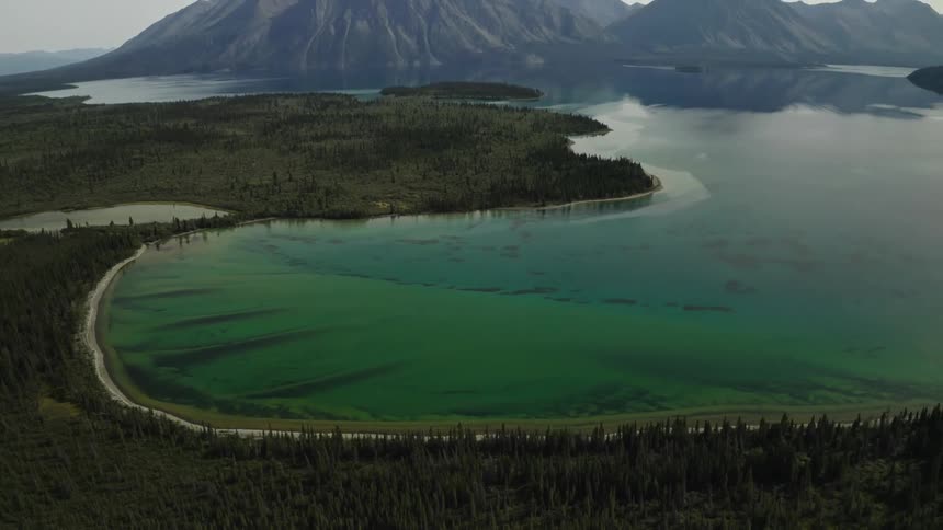 Aerial view of bay and beach with mountains
