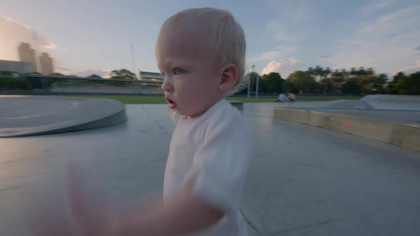 A child walking around outdoors
