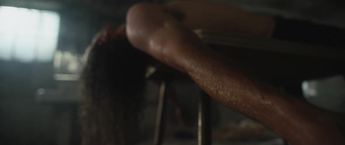 A person is laying on the table sweating
