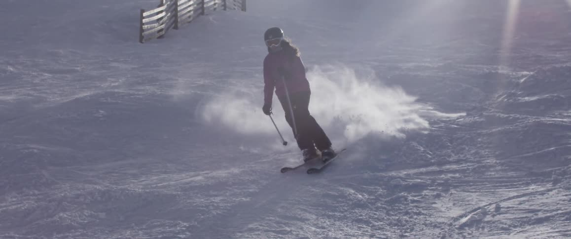 A person is skiing down a slope