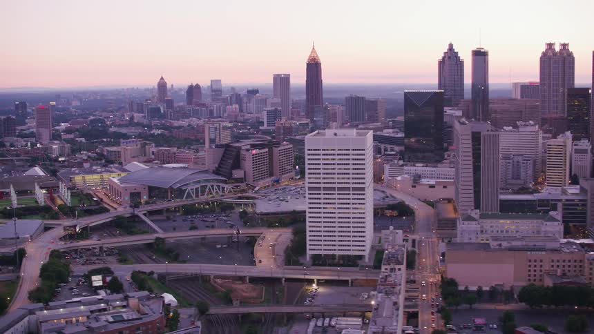 An aerial view of high rise office buildings and apartments in a city