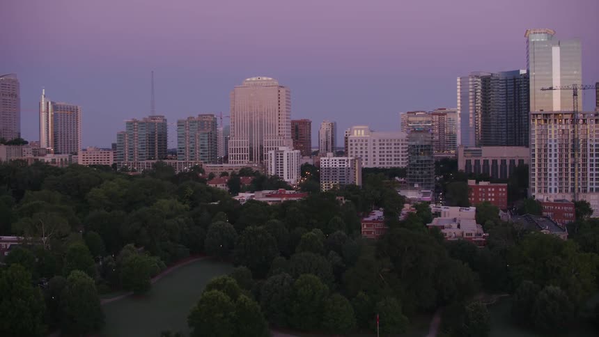 A park is before the large city
