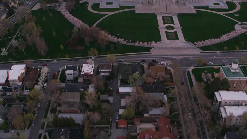Cars drive through the town