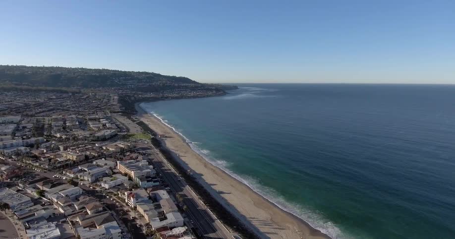 A city near a beach on a clear day
