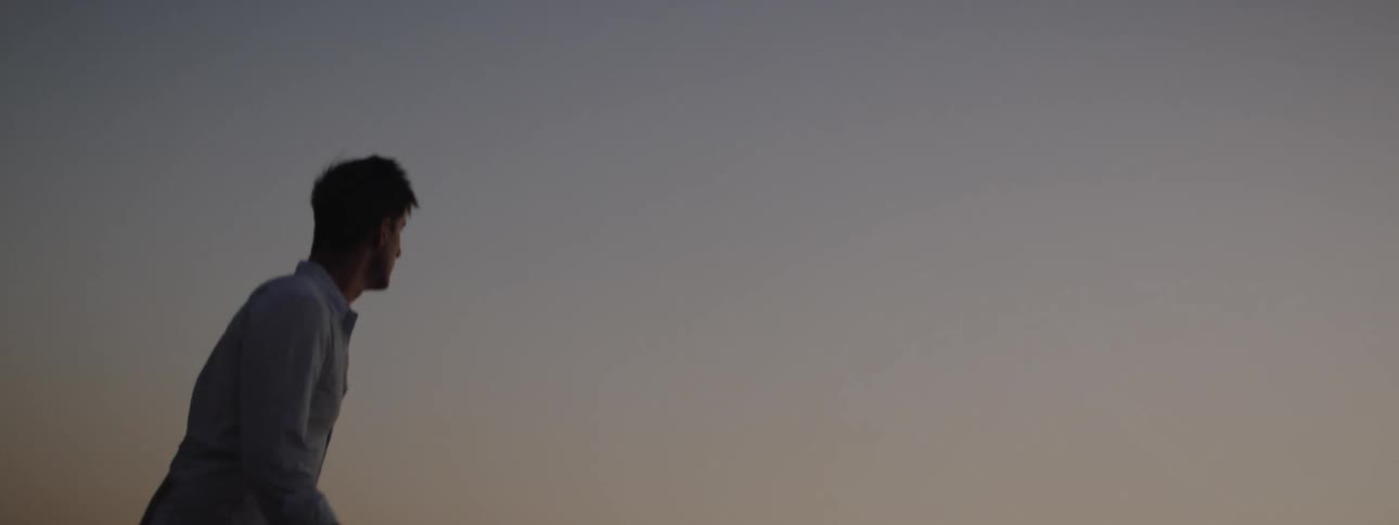 A man hikes in the desert