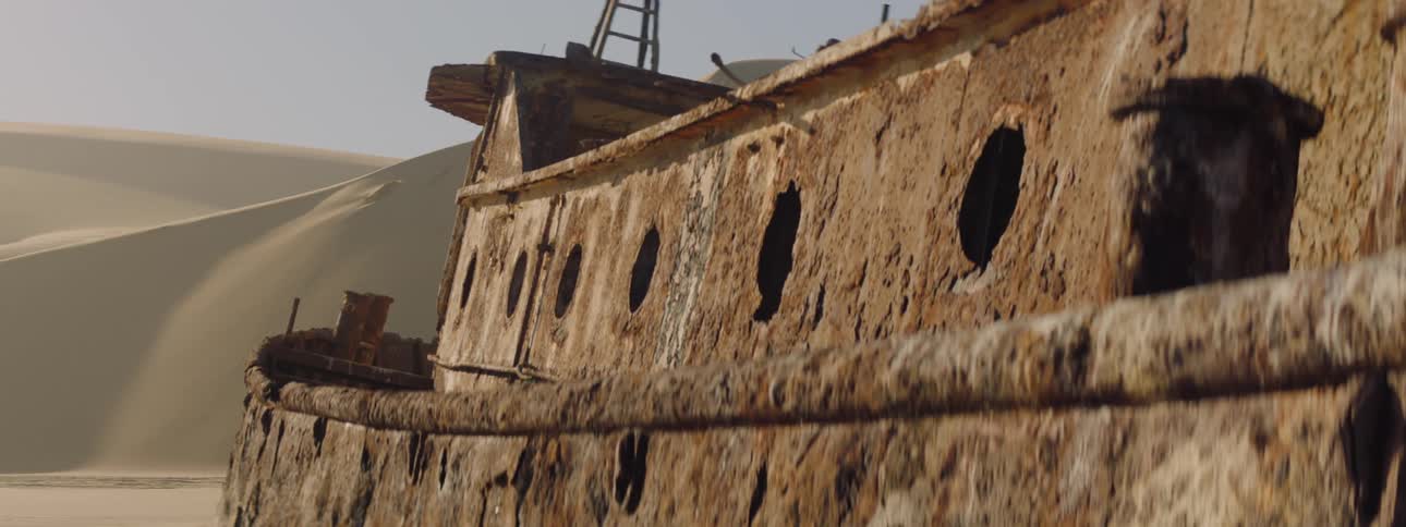 Rusty shipwreck in the desert
