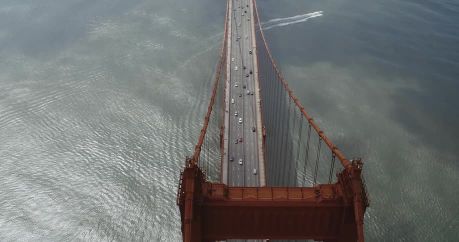 Vehicles travel across the bridge