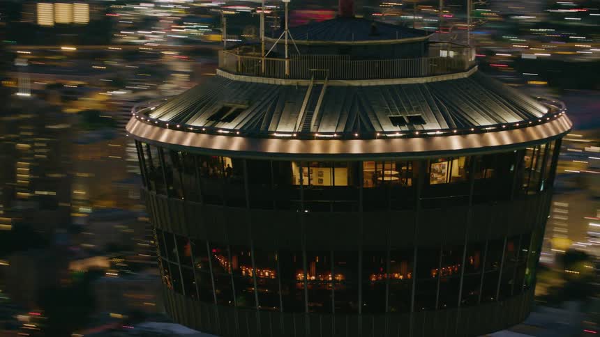The top of an observatory with people working in it
