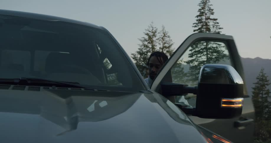 A man gets into his truck