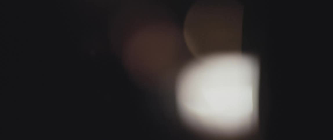 Lights can be seen on the dark road